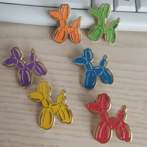 hard enamel pins with different enamel colours but with same glitter rainbow glitter